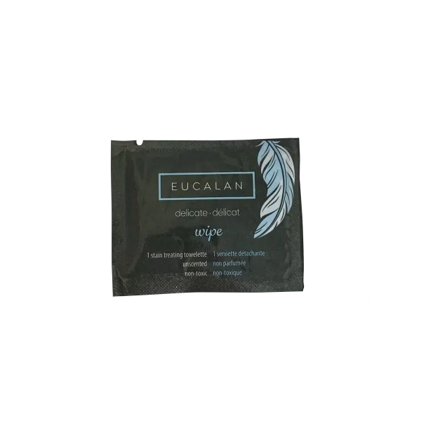 A small, black sachet from Eucalan features a feather design and includes one non-toxic, unscented stain treating towelette for garment freshening. Packaging states 1 stain treating towelette.