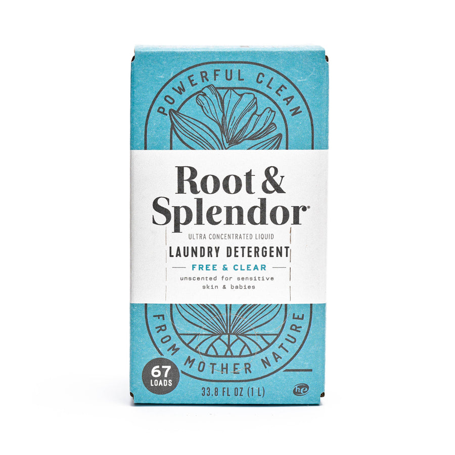 A blue and white box of Root and Splendor Laundry Detergent: Free and Clear, 1L (67 loads), features eco-friendly formula, botanical line art, and text highlighting powerful natural cleaning.