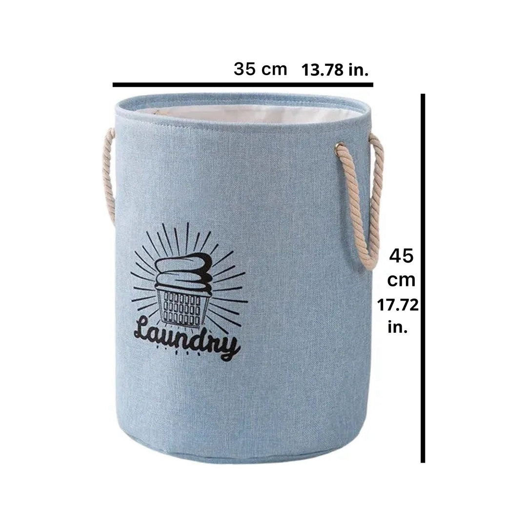 The All Things Laundry Cotton and Linen Collapsible Clothes Hamper features a cylindrical design with rope handles, laundry item print, and measures 35 cm in diameter by 45 cm in height, combining convenience and style for your laundry needs.