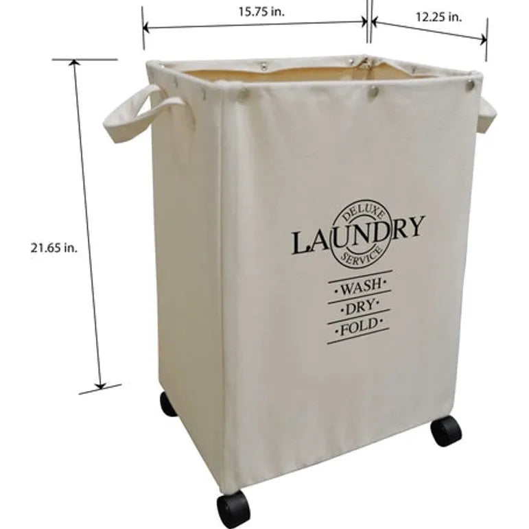 The Hamper on Wheels by DesignStyles Home is a rectangular, decorative laundry hamper with a beige fabric exterior labeled Deluxe Laundry Services - Wash, Dry, Fold and features side handles and four black wheels. Dimensions: 21.65H x 15.75W x 12.25D—crafted for durability and style.