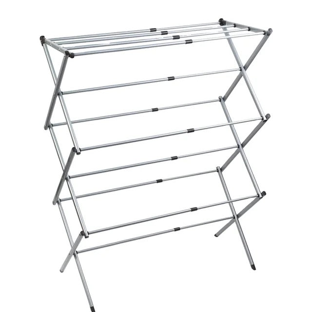 The All Things Laundry Drying Rack is a Foldable 3-Tier Expandable metal rack. It features an X-shaped support structure and horizontal bars, ideal for efficient clothes drying without occupying much space.