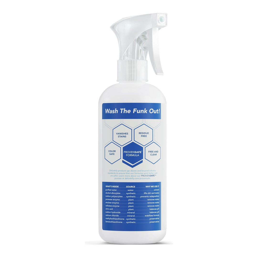 The Defunkify Stain Remover Spray-Free and Clear-16 oz features a white bottle with a blue label, hexagons, and benefits like enzymatic stain removal. Its ProvenSafe with ingredients and usage instructions provided for effective cleaning.