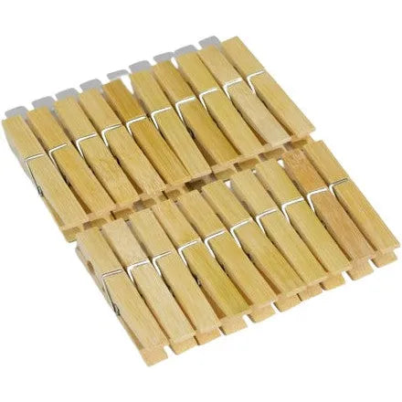 Two groups of Zero Waste Clubs BAMBOO Clothespins, each with twelve pins, are displayed on a white background. Crafted from sustainably sourced bamboo, these plastic-free alternatives showcase their natural wood texture and metal spring mechanism.