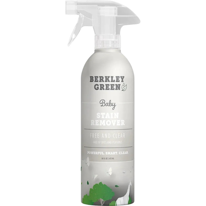 A 16 oz Berkley Green Baby Fabric Spray Stain Remover with a trigger nozzle features a green and white Free and Clear label, boasting plant-powered technology. The design includes plant and horse illustrations, free of dyes and perfumes.