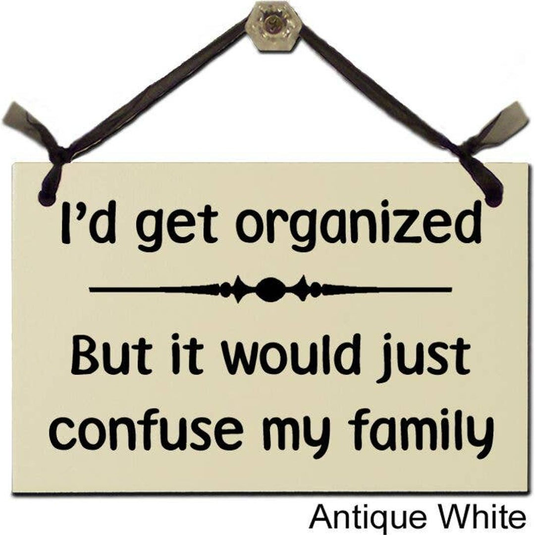 The Laundry Room Id Get Organized Sign by Wish Upon A Sign has the text: Id get organized but it would just confuse my family, features an antique white finish, and hangs elegantly by a black ribbon, crafted from sustainable materials.