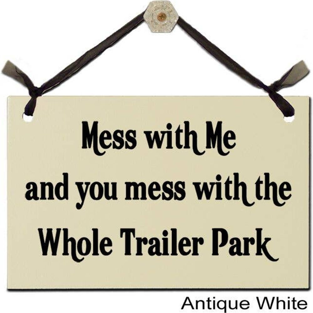 The cream-colored MDF sign, Mess with me and you mess with the whole trailer park, hangs from black ribbons. It features bold black text and an antique white corner with an acrylic finish. From Wish Upon A Sign, this is the Laundry Room “Mess with Me” Sign.