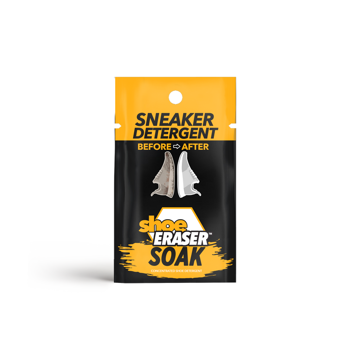 The yellow and black Shoe Eraser SOAK, Sneaker Detergent by SneakERASERS displays a before-and-after illustration of a dirty and clean sneaker on its packet.