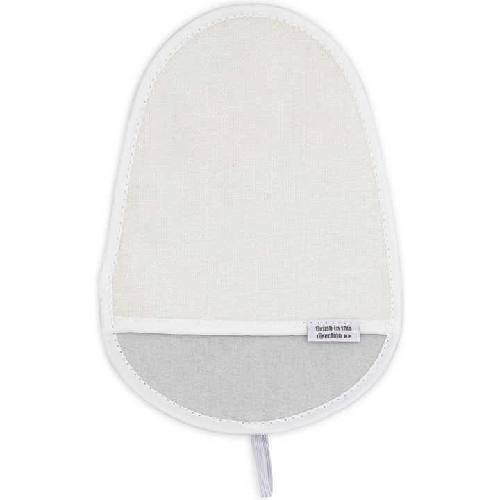 The Anti Static & Lint Removing Mitt by Full Circle Home is a beige exfoliating shower mitt with a white border and labeled brush in this direction. It exfoliates and removes lint efficiently and includes a loop for easy hanging.